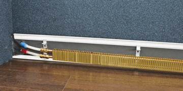 Что нужно знать про монтаж греющего плинтуса и его достоинства